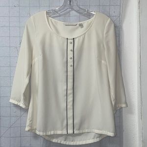 Ivory long sleeve top with gray trim accents.